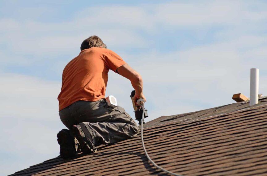 Roofer Installing Roof Tiles