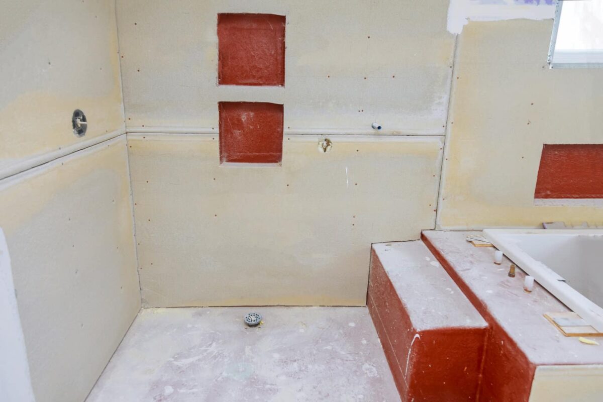 Should You Sheetrock Behind a Bathtub?